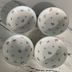 Four very vintage rosebud sauce dishes